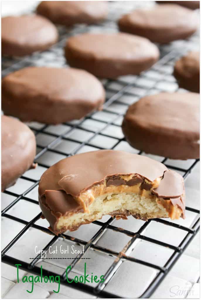 Photo of tagalong cookie with bite taken, on a cooling rack