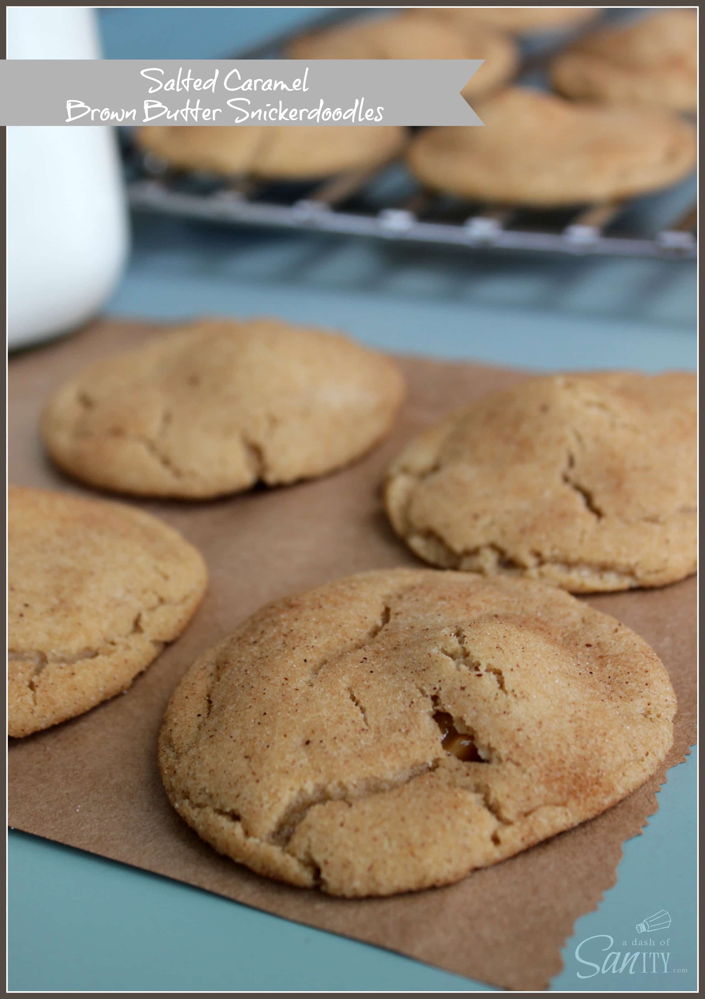 Salted Caramel & Brown Butter Snickerdoodles on a piece of brown paper and cooling rack