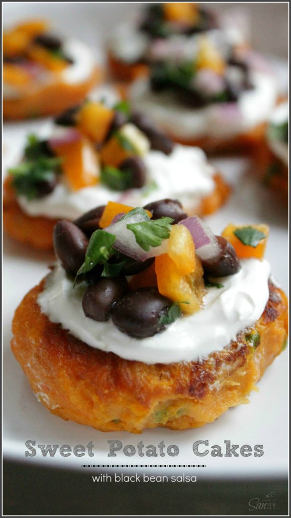 sweet potato cakes topped with sour cream and black bean salsa