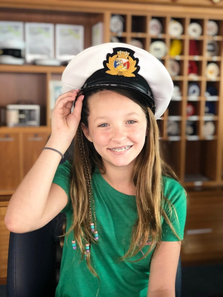 photo of jordan with ship captain's hat on