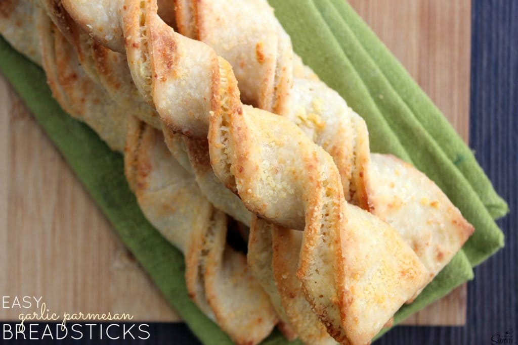 Easy Garlic Parmesan Breadsticks are the perfect complement to any meal. Serve them as is or with a sauce, either way they will become a family favorite!