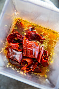 overhead shot view of blender with colorado chile sauce ingredients