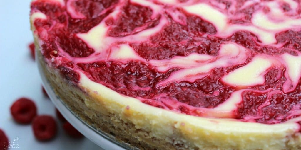 Lightened up Fresh Raspberry Cheesecake is an easy yet delicious recipe, made with low-fat cream cheese, yogurt, and fresh raspberries.