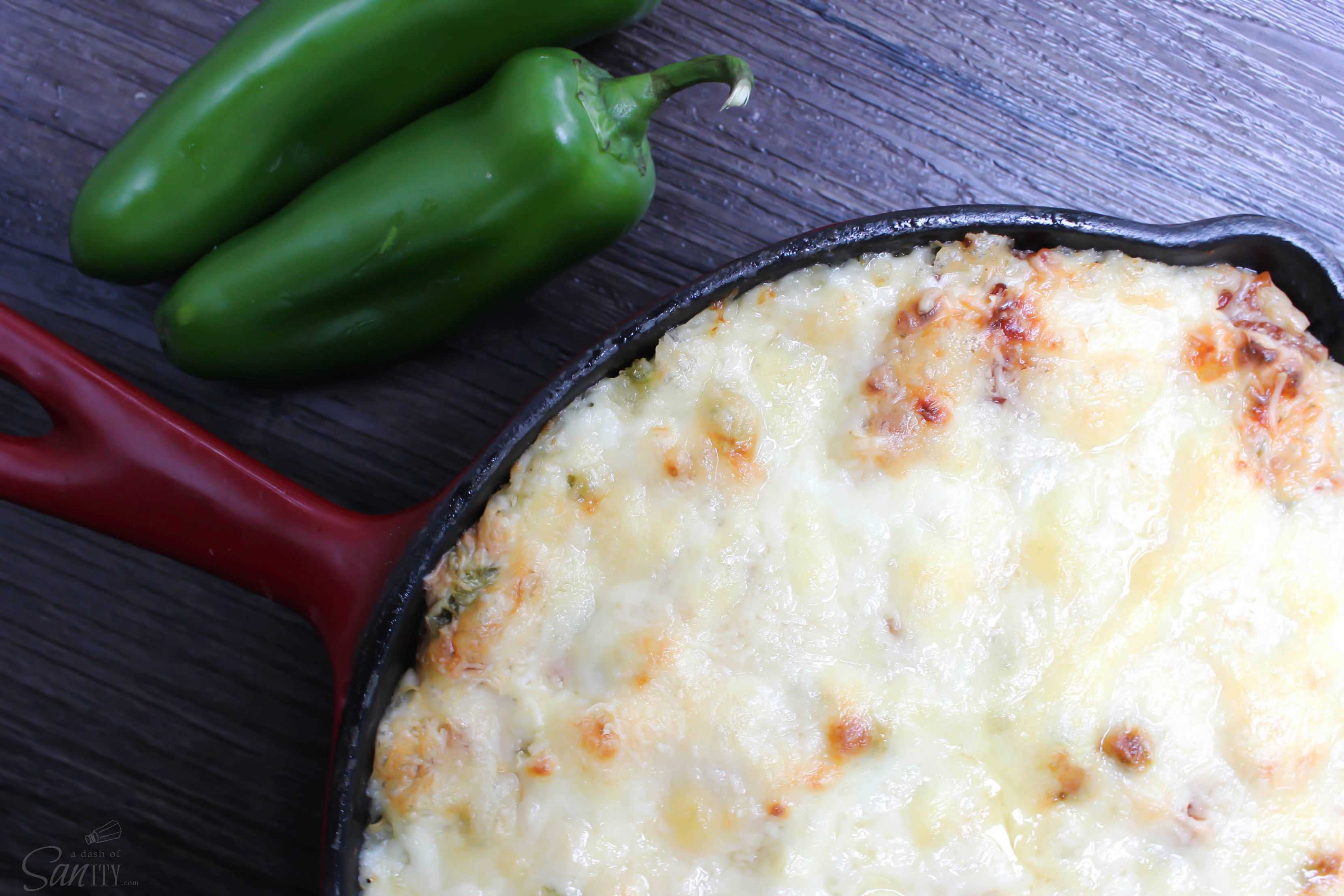 Skillet Jalapeño Popper Dip has all the flavor of a jalapeño popper but without the hassle. Served to you in a bacon filled, cheesy skillet of yumminess. 