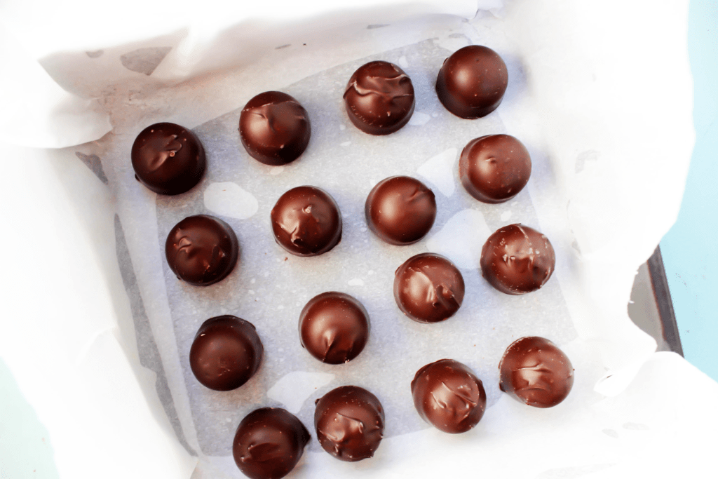 Chocolate Covered Cherries Fudge makes the perfect holiday treat. Taking chocolate covered cherries and placing them in the center of every fudgey bited