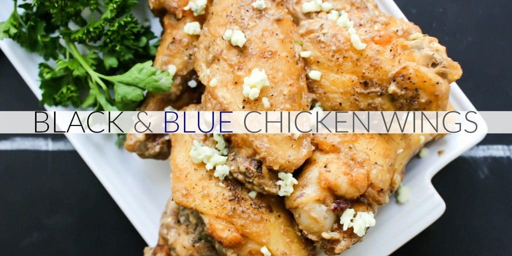 Black and Blue Chicken Wings are tossed in a blue cheese vinaigrette, pepper, three kinds of garlic, & crumbled blue cheese. This isn’t a wing for the weak.