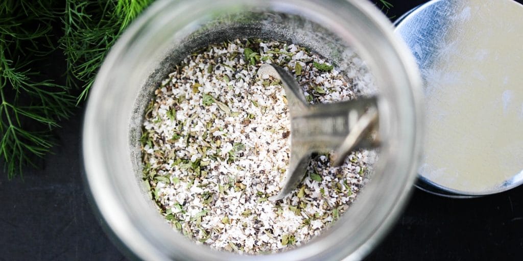 overhead shot of glass jar with seasoning