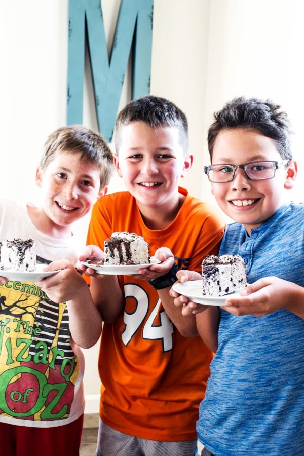 COOKIES & CREAM HOT FUDGE SAUCE - Cake dished and ready to eat on white plates 