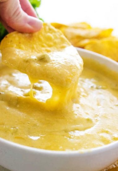 Two classics collide in this CROCK POT GREEN CHILE QUESO. Mild & cheesy, it's filled with green chiles & 4 kinds of cheese, it makes game day delicious.