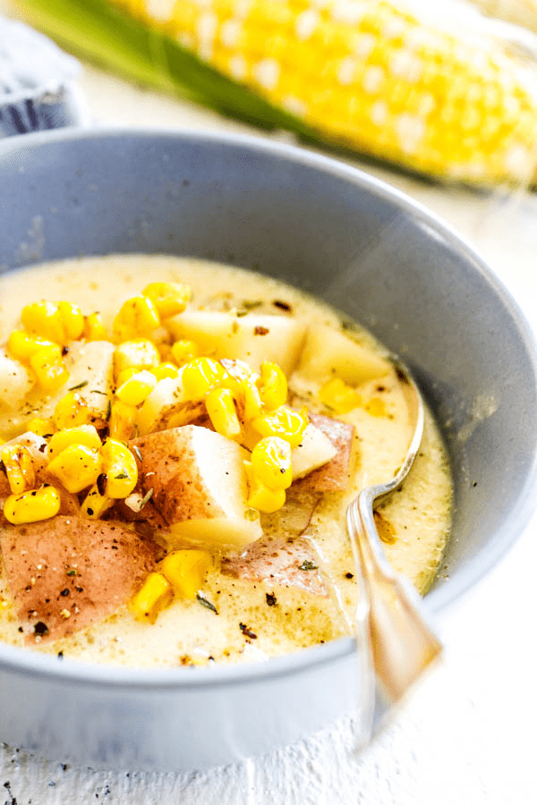 Easy & delicious, this SLOW COOKER POTATO & CORN CHOWDER is the ultimate comfort food. The secret to this chowder recipe is cheese, lots of cheese.