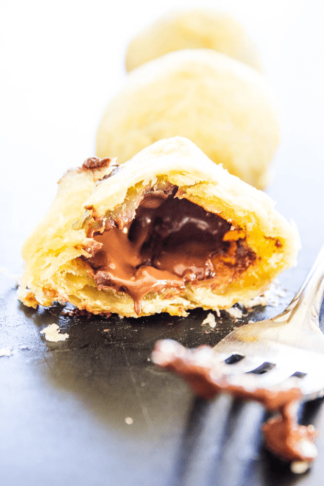 This recipe for 2 INGREDIENT PAINS AU CHOCOLATS is simple, easy and delicious. Soon you will be eating this classic pastry fresh from your oven.