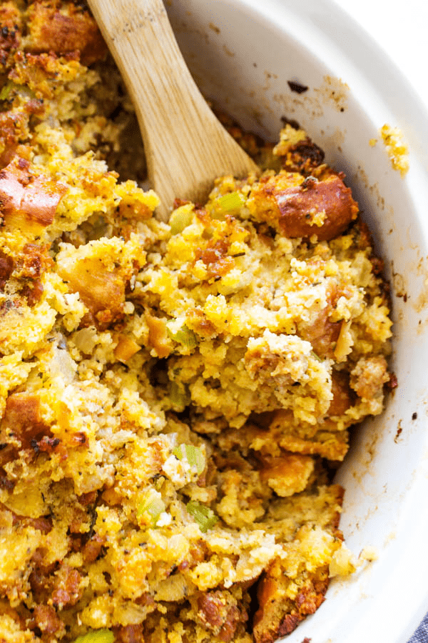 This traditional CORNBREAD STUFFING recipe is full of flavor and loaded with herbs, sausage, onion, celery and garlic; making it a holiday favorite.