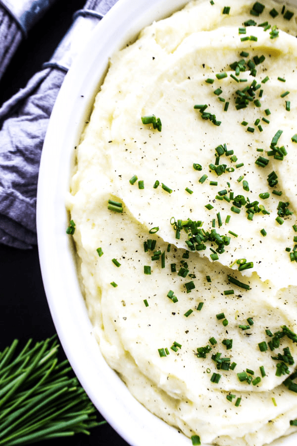 mashed potatoes served in white baking dish