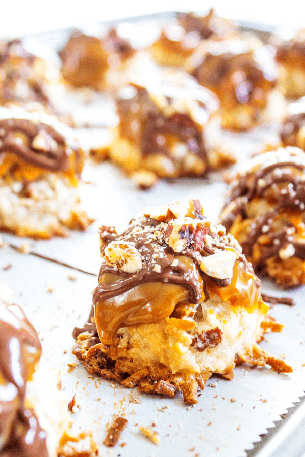 finished cookies lined up on a baking sheet