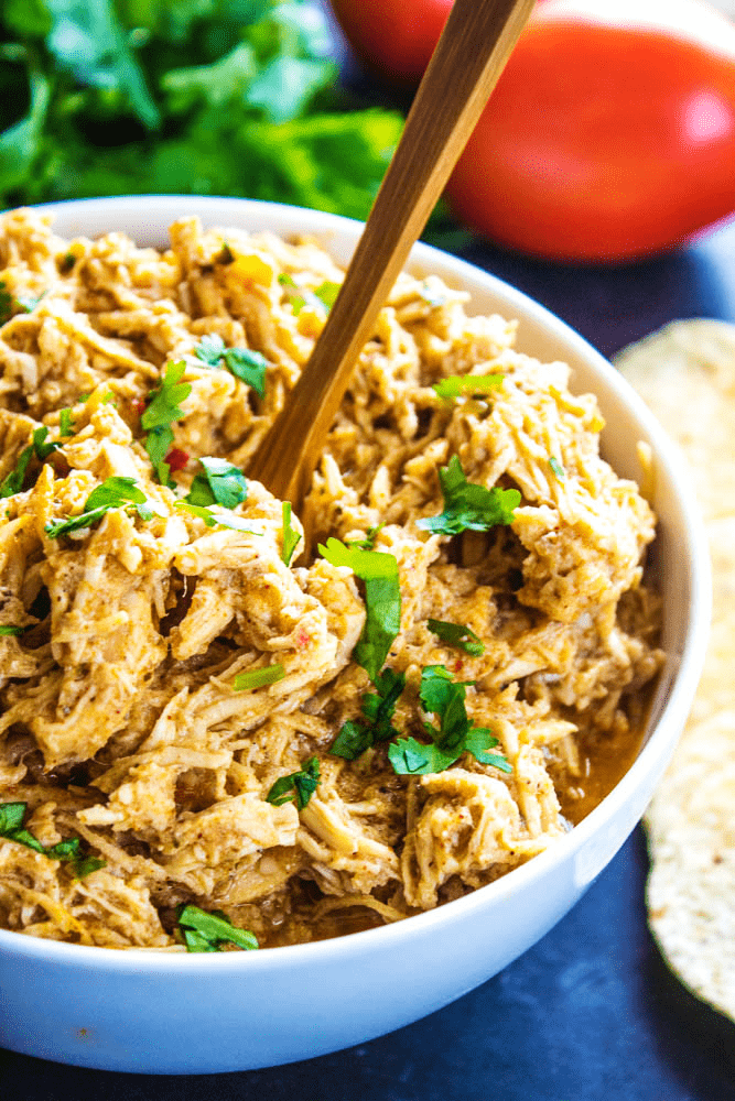 SLOW COOKER MEXICAN SHREDDED CHICKEN is simple, versatile and insanely delicious. Wrap it up, smother it in cheese and devour it.