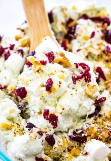 WATERGATE SALAD - A classic & traditional holiday side dish that everyone loves. Made with Cool Whip, marshmallows, pistachio pudding and pineapple, it's deliciously easy.