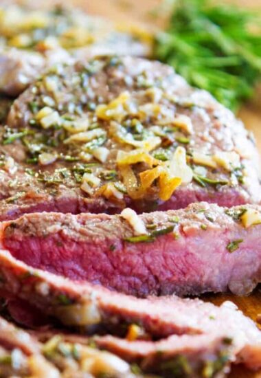 Mouthwatering and insanely delicious and easy, this PAN SEARED STEAK WITH ROSEMARY AND GARLIC BUTTER can make your kitchen the best steakhouse around.