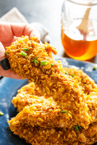 Ready in 30 minutes, baked to perfection and dipped in a simple honey garlic sauce these BAKED HONEY GARLIC CHICKEN TENDERS are out of this world.