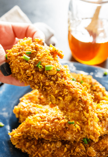 Ready in 30 minutes, baked to perfection and dipped in a simple honey garlic sauce these BAKED HONEY GARLIC CHICKEN TENDERS are out of this world.