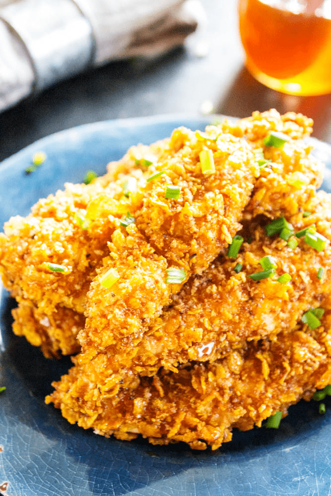 stack of Baked Honey Garlic Chicken Tenders on a plate