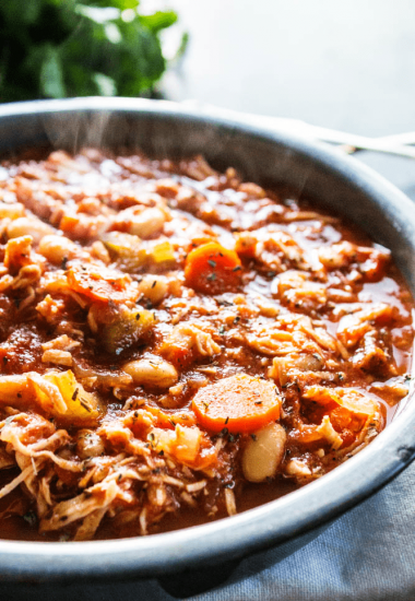 Deliciously simple slow cooker ITALIAN CHICKEN STEW is comforting and full of flavor. Loaded with veggies and chicken it's hearty making a perfect dinner.
