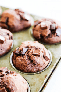 SKINNY DOUBLE CHOCOLATE BANANA MUFFINS - Made with whole grains, flax seed, Greek yogurt and dark chocolate, you will love this healthier delicious treat.