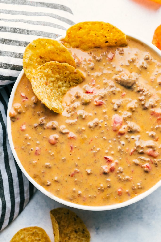 overhead view of easy beef queso with tortilla chips