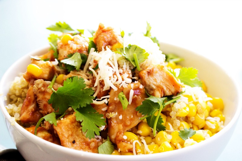 photo of  Baked Barbecue Chicken and Quinoa Bowl, white bowl, garnished with cilantro