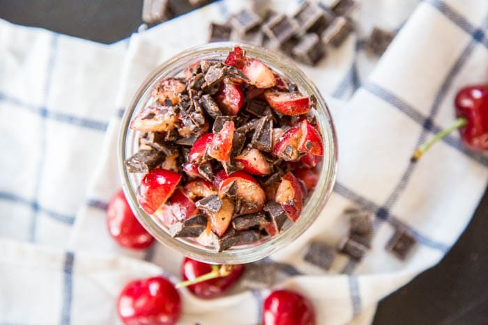 Photo of the chopped chocolate and cherries in a jar