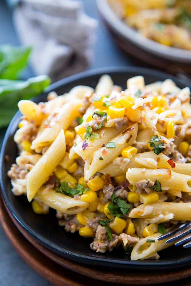 creamy sausage pasta on a plate