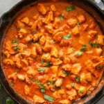 butter chicken in a skillet overhead shot