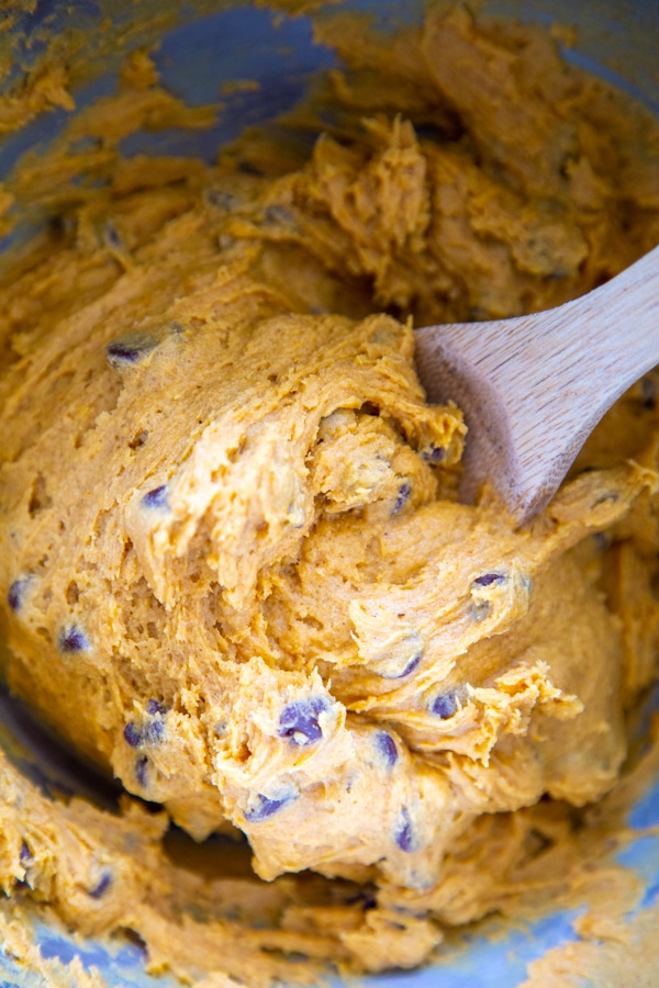 the cookie dough being mixed in a bowl.