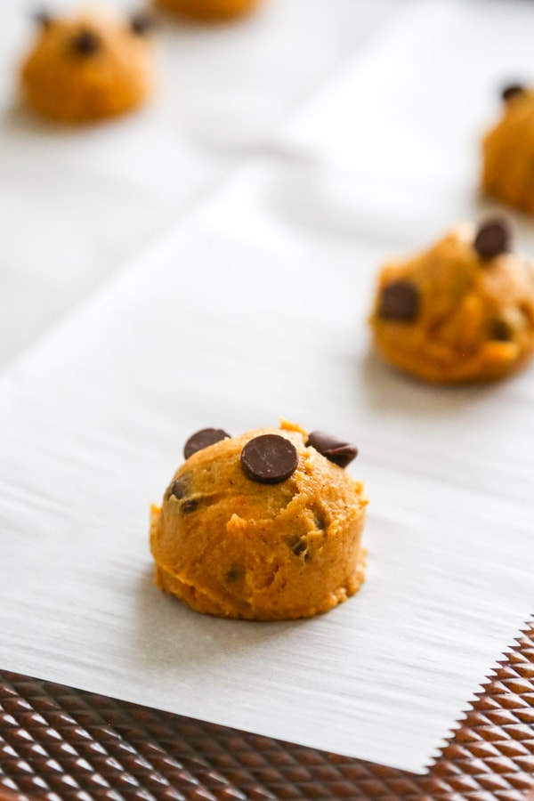 the cookie dough balls on the cookie sheet.