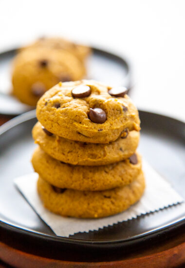 a stack of pumpkin chocolate chip cookies.