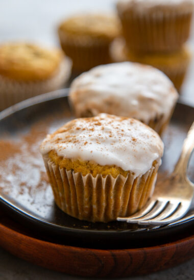 one glazed pumpkin zucchini muffin.