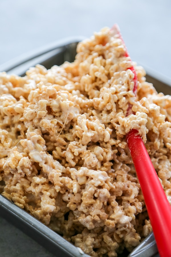 the mixture being pressed into the pan.