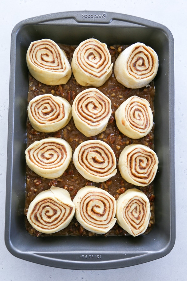 the rolls in the pan ready to rise.