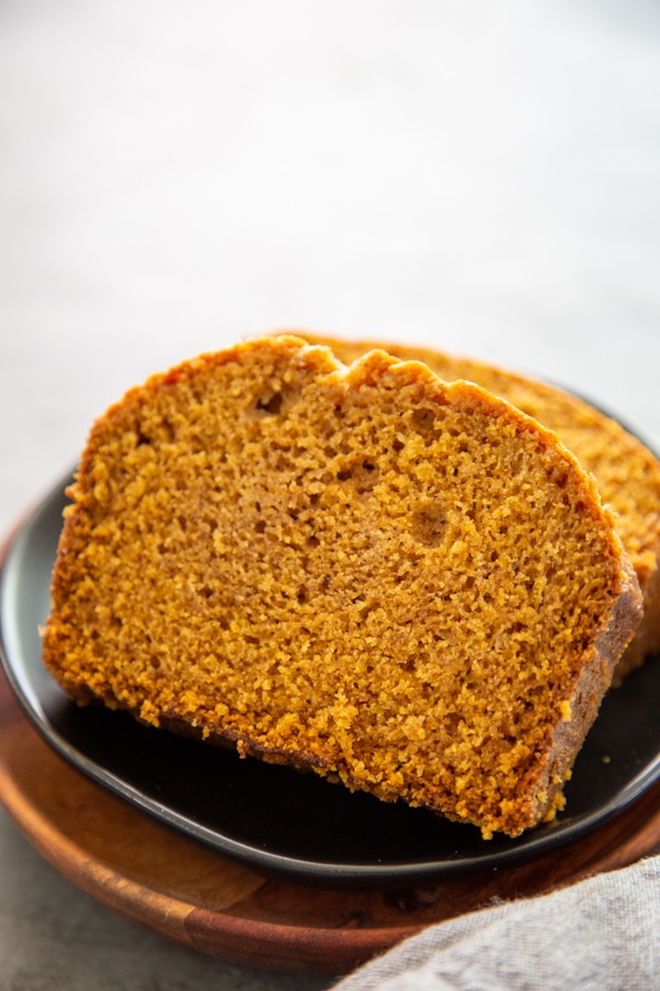 close-up photo of a slice of pumpkin bread.