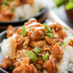 orange chicken on a plate.