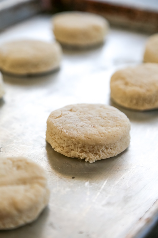 biscuits on a baking sheet ready to bake.