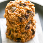 a close-up shot of a stack of zucchini oatmeal cookies.