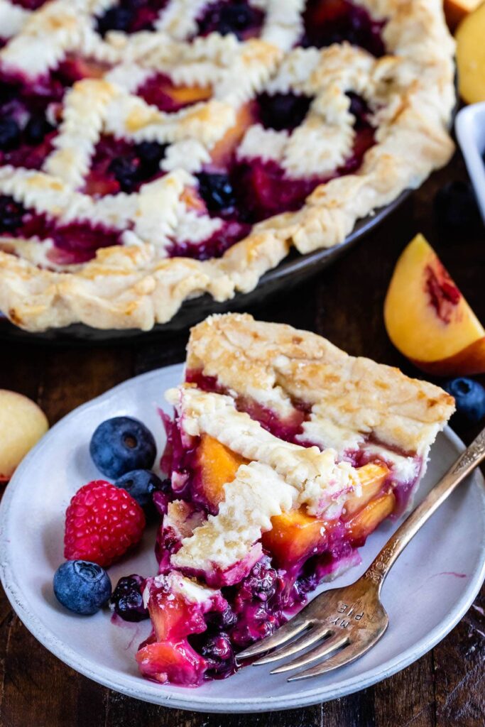 slice of peach raspberry pie