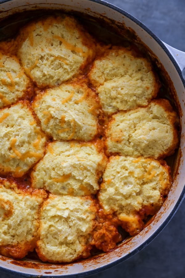 overhead photo of the chili casserole topped with biscuits.