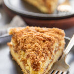 a slice of coffee cake on a plate.