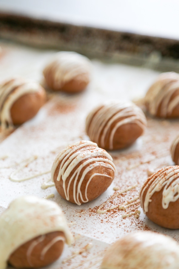 the dough balls drizzled with icing.