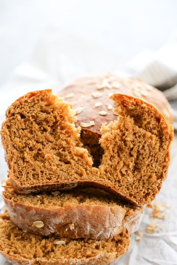 a piece of bread torn in half.