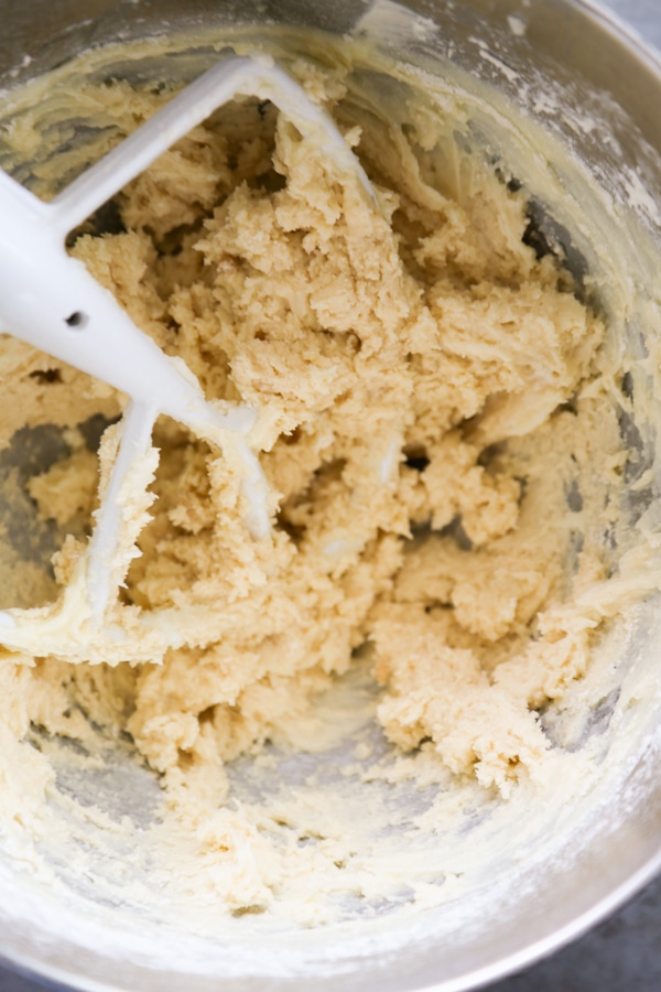 the cookie dough being mixed in a bowl.
