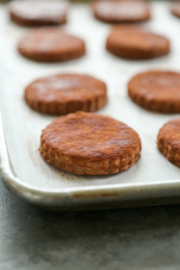 the chocolate biscuits on a sheet pan ready to be baked.