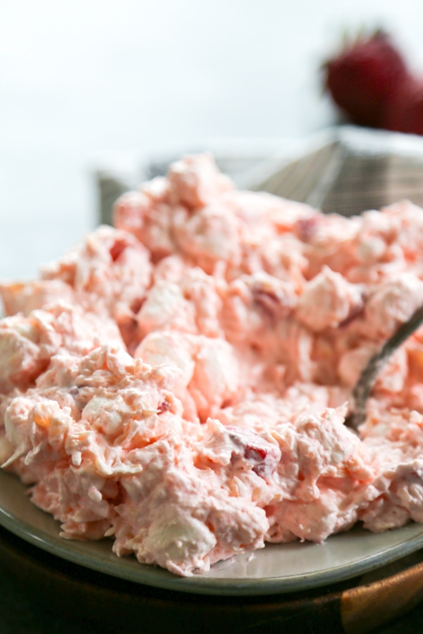 a bowl of strawberry watergate salad/