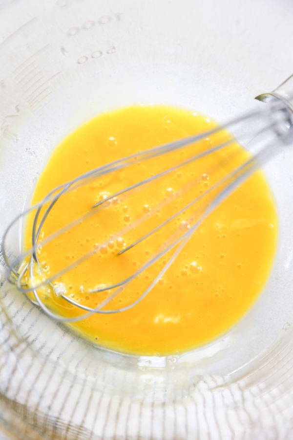 whisked eggs in a bowl.